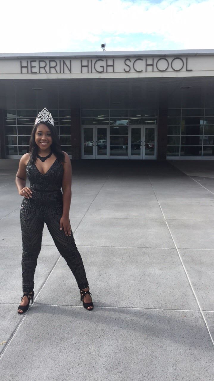 Looking gorgeous as always HHS's Homecoming Queen, Kaiyah King poses in front of Herrin High School before the parade on Friday