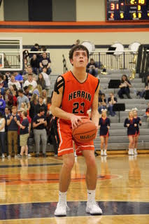 Junior Drew Ringel prepares to shoot a freethrow. 