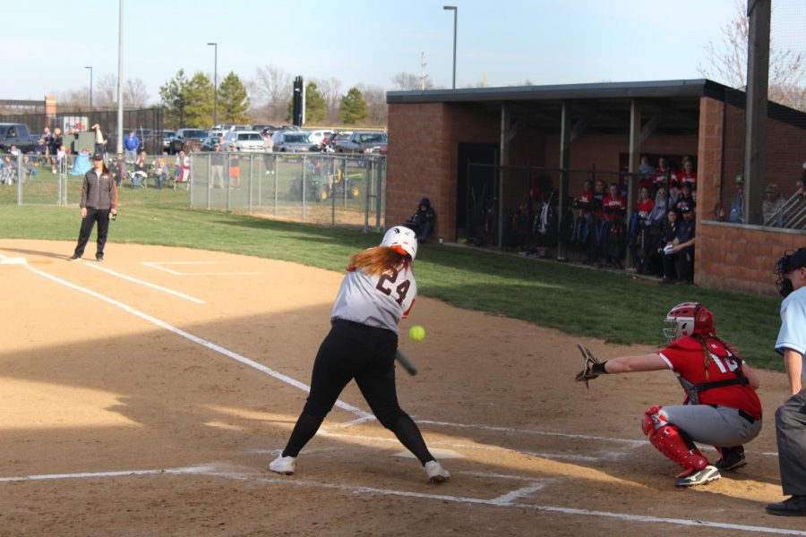 Junior Alexandria Paintner swings at a fastball from a Johnston City pitcher.