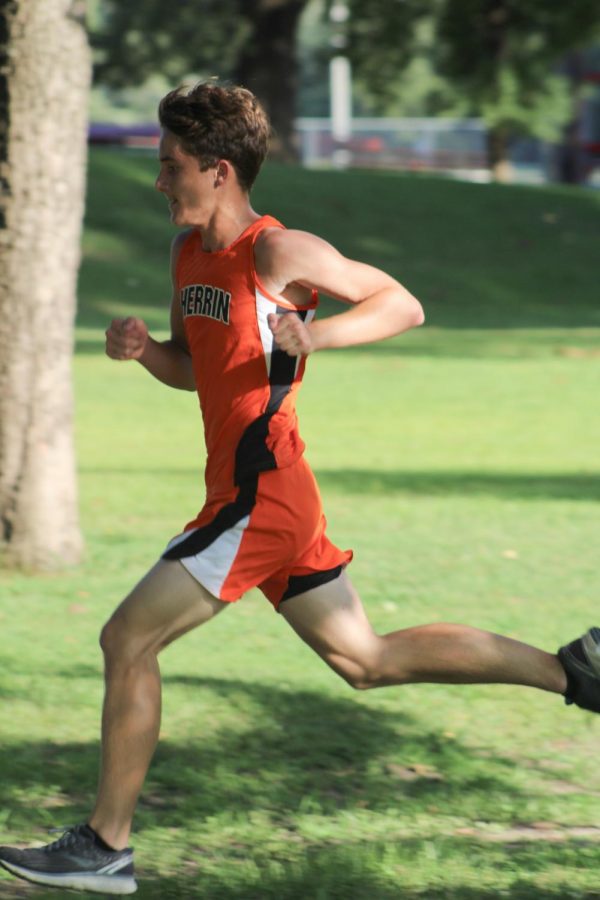 Cameron Christ (9) speeds up while running towards the finish line on August 27th at West Frankfort. 