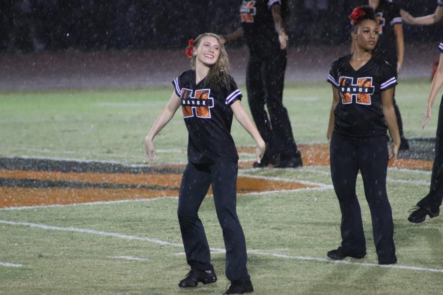 Shanie May (12) dances her heart out during the half time performance at the Benton versus Herrin football game.