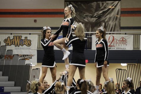 Lexi Price (12) gets spotted by Briley Engram (9), Cadence Tessone (9), and Kelsi Bigler (9). 