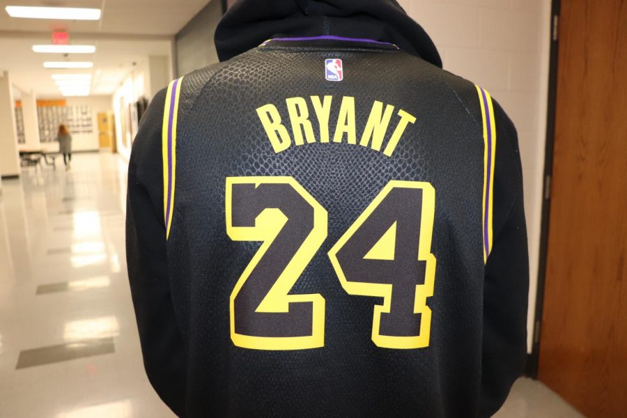 Kaden Bigler (11) celebrates Kobe Bryants life by wearing one of his jerseys.