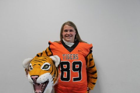Branson Hill poses with the tiger head.