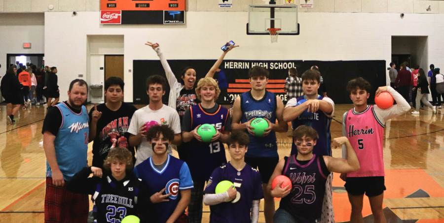 The winning team of the dodgeball tournament poses for a photo.