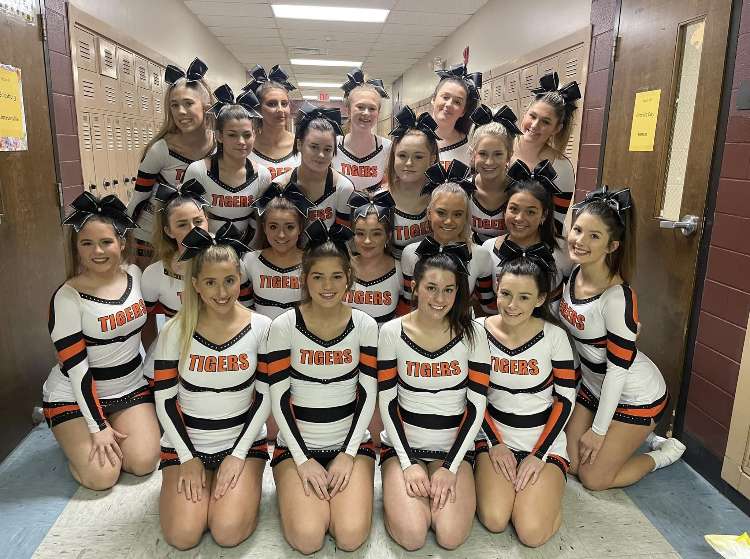 The+Herrin+Tiger+Cheerleaders+pose+for+a+photo+after+the+IHSA+Cheer+Sectional.