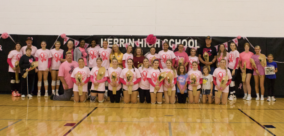 Lady Tigers stand with the survivors and those fighting to show their support in the fight against cancer.
