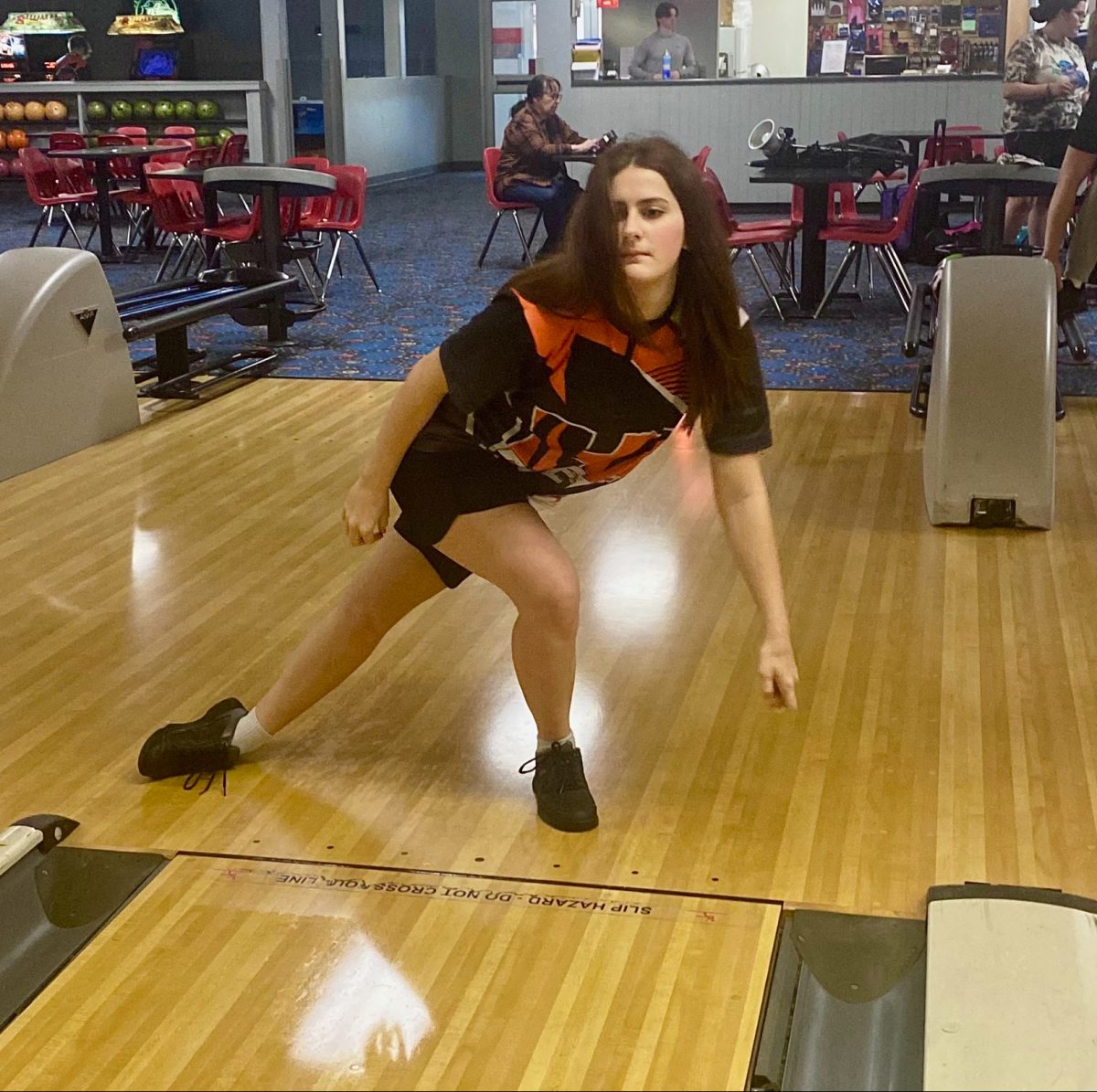 Delaney Restivo (11) throws a shot during practice at Herrin Bowl to perfect her strikes.