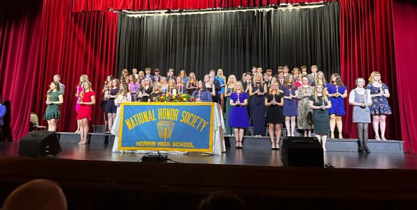 NHS Inductees Stand at the Ready to Recite the Pledge, Stepping Into Their Critical Roles at HHS.