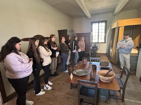 French Students explore a colonial-era French main room.