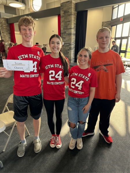 The freshman-sophomore Brain Games team (Tyler Dodson, Maddie Martin, Josie Brandon, and Logan Groves) proudly display their team name for the royal-themed Sectional.