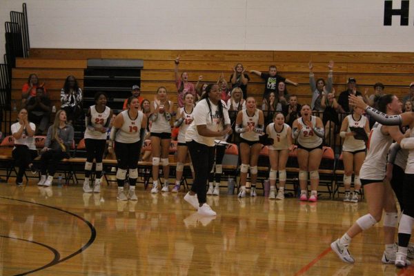 Coach Whitehead celebrates with her team.