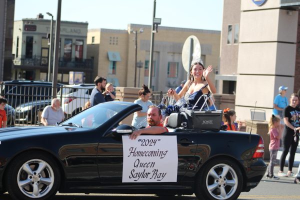 Homecoming Queen Saylor Ray (12) Taking her Place at the Parade.