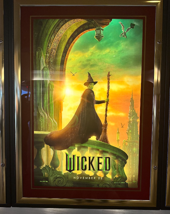  The Wicked movie poster displayed in theaters