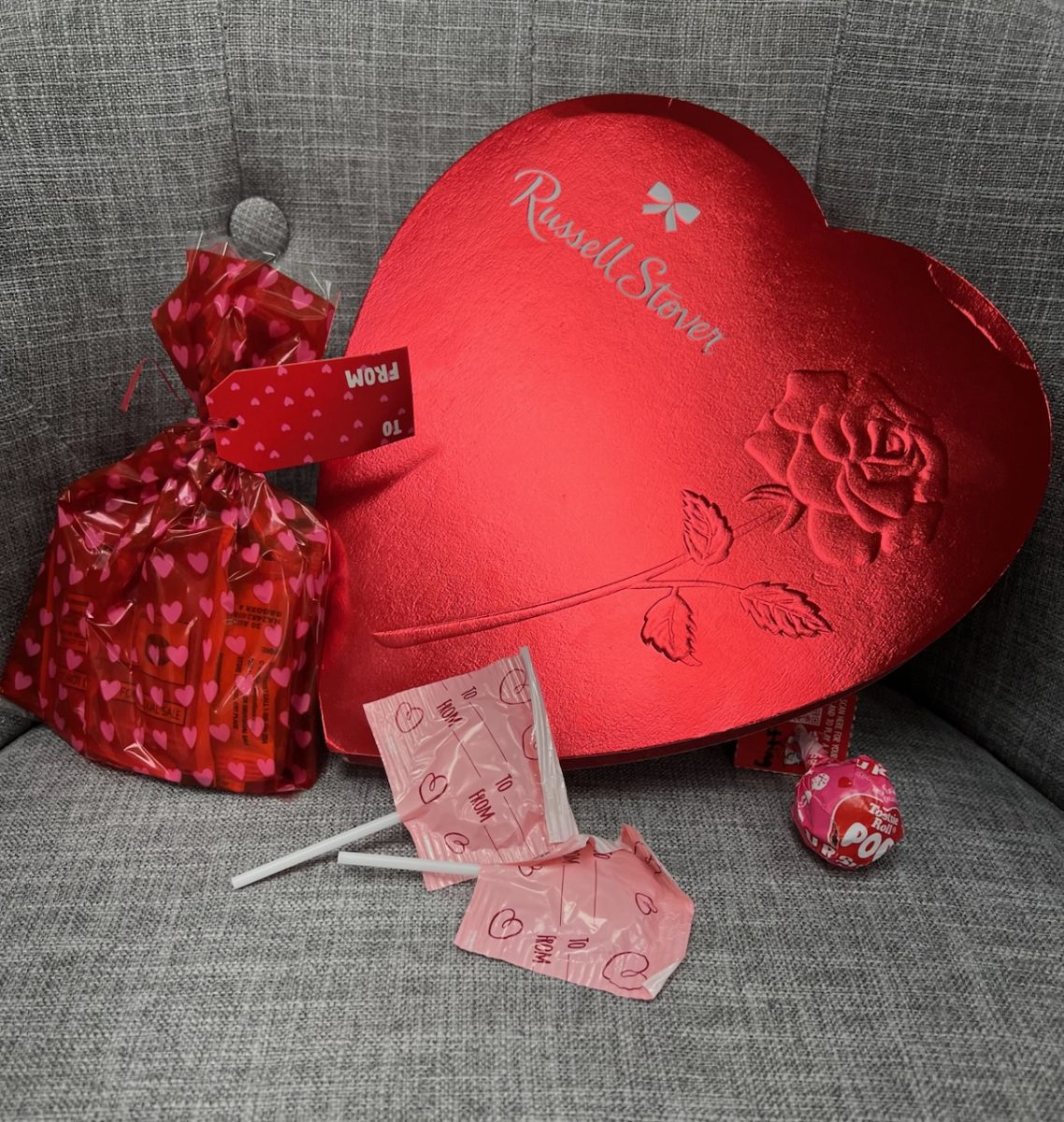 Typical Valentine's gifts are displayed.