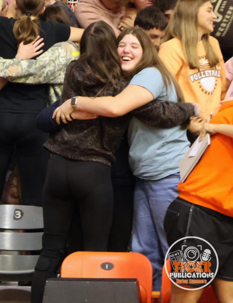 Students gave hugs as part of one of of Mr. Clark's activities. 