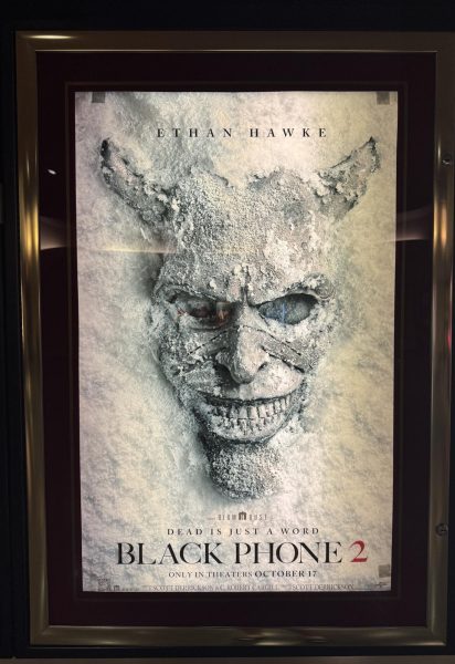 Black Phone 2’s poster featuring the damaged mask of the Grabber
