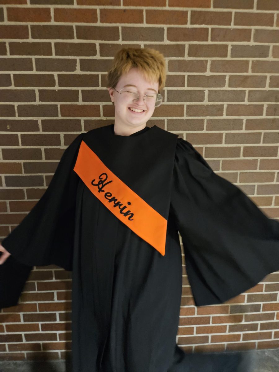 Cain Simmons (11) poses after the All-State Choral performance in Peoria, Illinois.