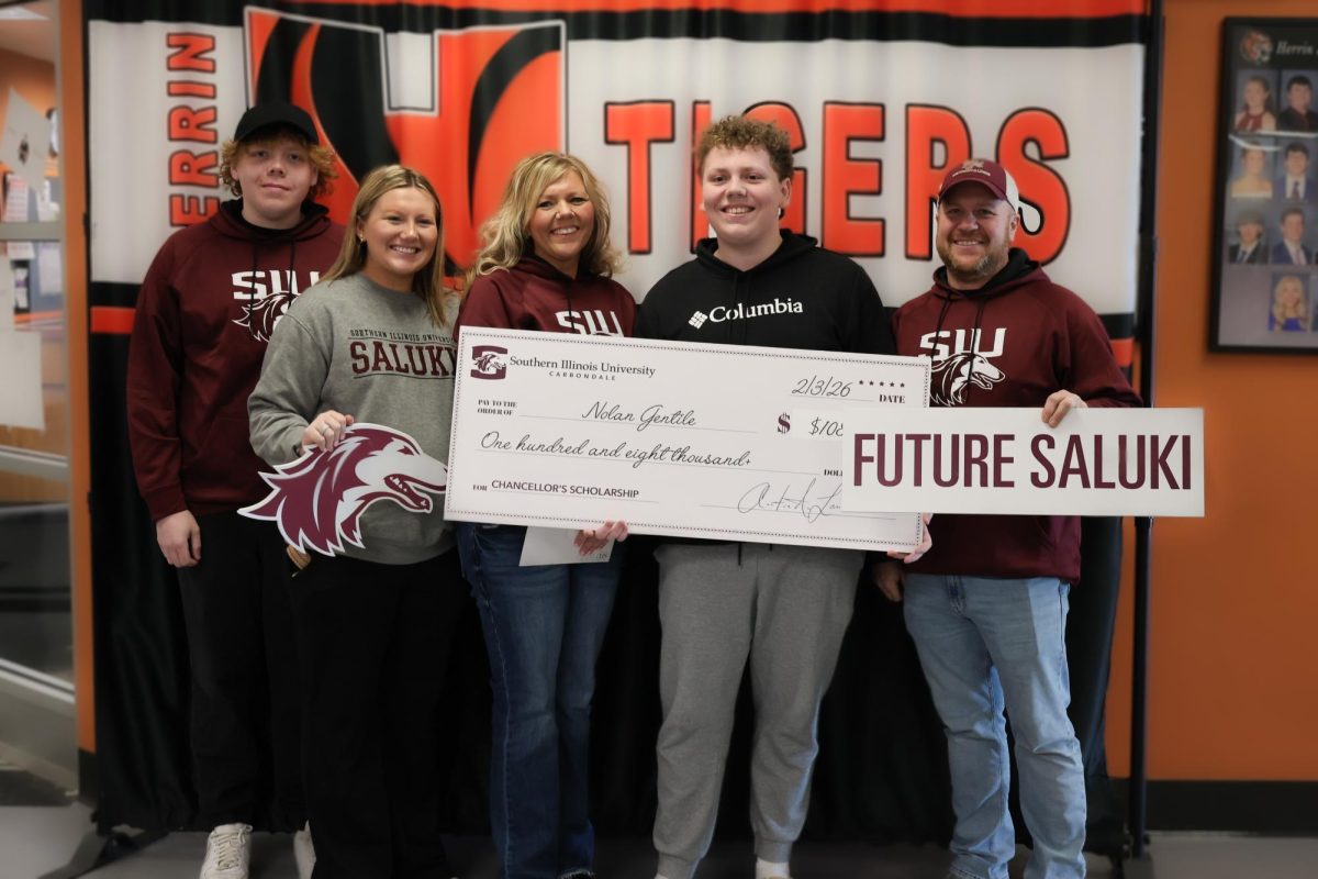 Chancellor's Scholarship recipient Nolan Gentile poses along with his family.