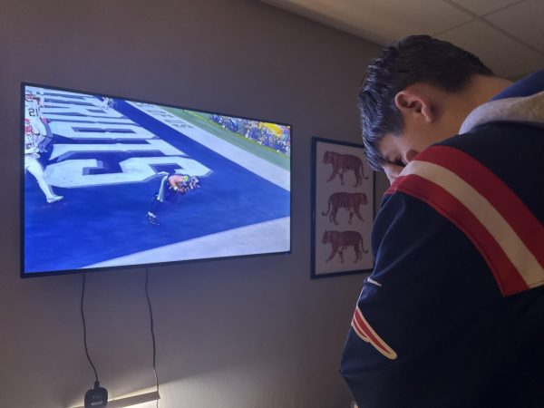 A Patriots fan accepts the teams' loss after the Seahawks successful fourth quarter touchdown.